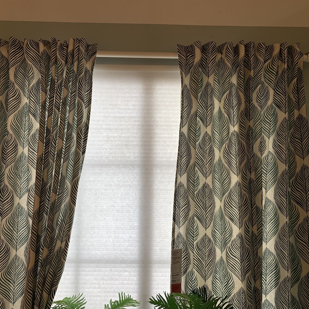 Abstract leaf pattern curtains in home interior