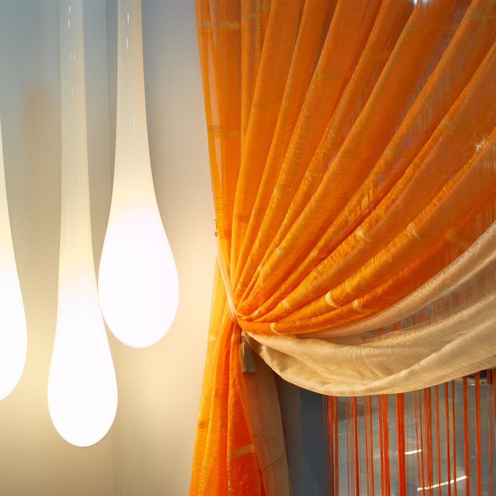 abstract-white-lamps-and-orange-sheer-curtains Abstract white lamps and orange sheer curtains