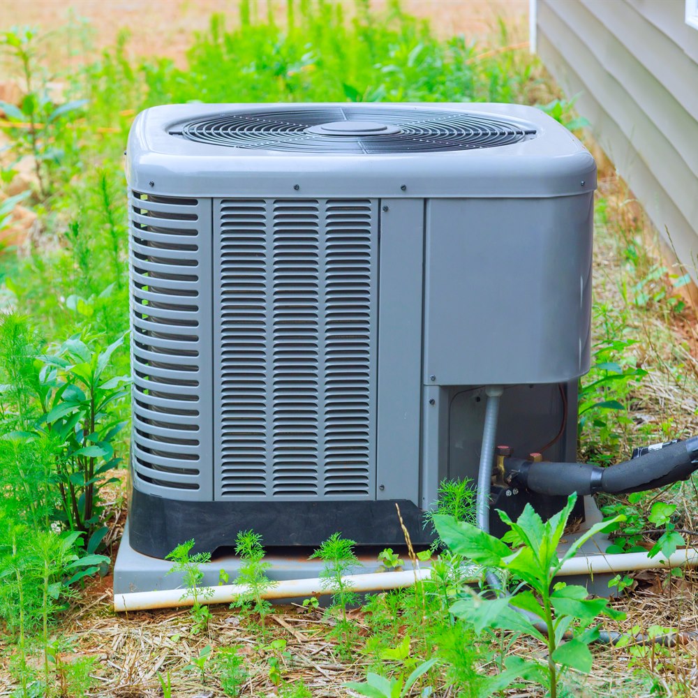 Air conditioner unit near residential building