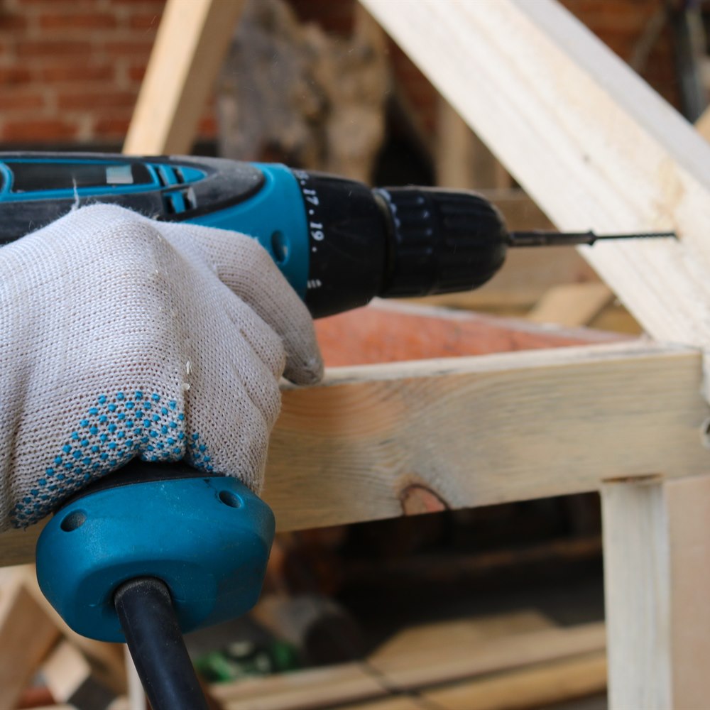 assembling-wood-framing-with-power-drill Assembling wood framing with power drill