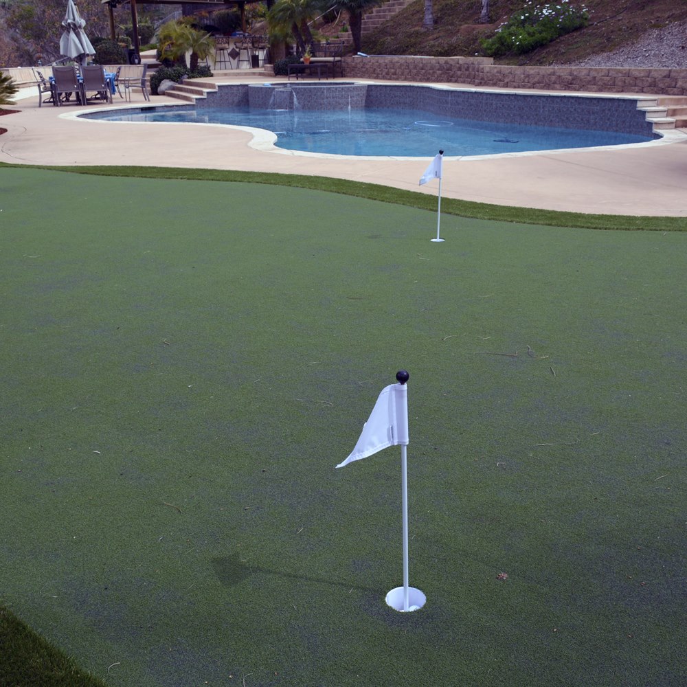 backyard-putting-green-beside-a-pool Backyard putting green beside a pool