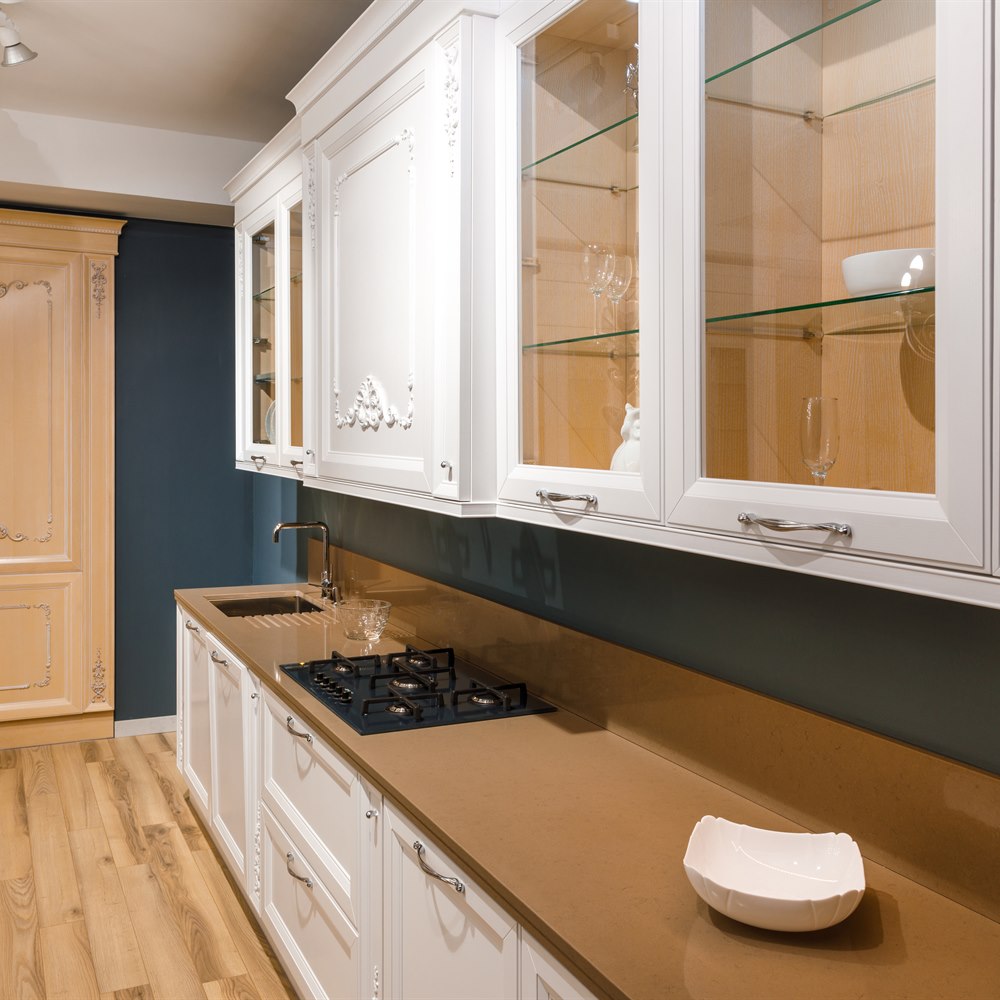 Classic white kitchen with brown countertop