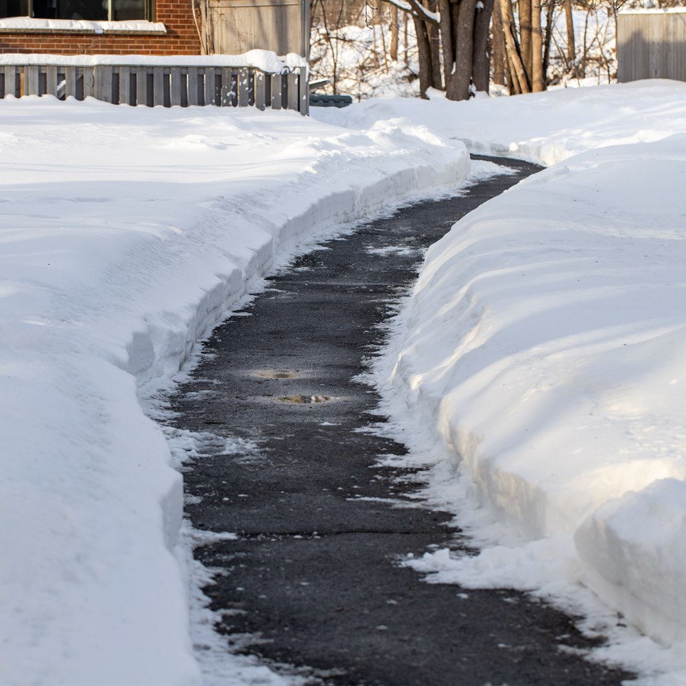 Cleared path through deep snow after winter storm