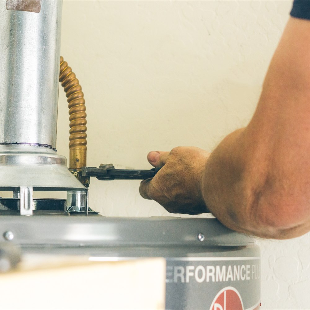 Close up of plumbing repair with silver pipes