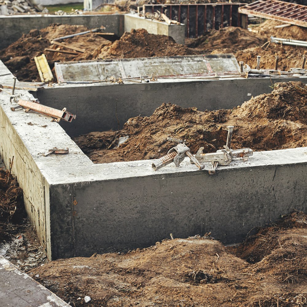 construction-site-foundation-with-concrete-walls-a-2026 Construction site foundation with concrete walls