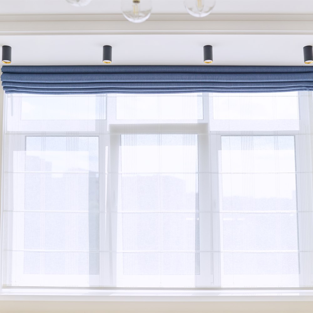 cozy-window-view-with-blue-shade Cozy window view with blue shade
