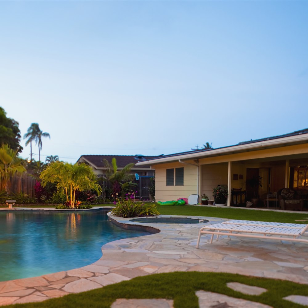 Evening view of a private home pool