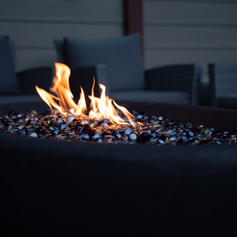 Fire pit glowing with warm light at night