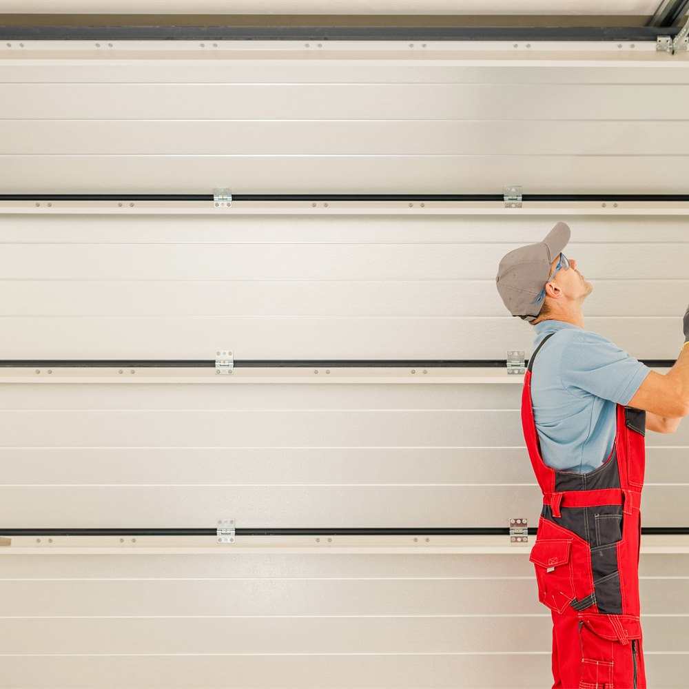 Garage door installation by skilled worker
