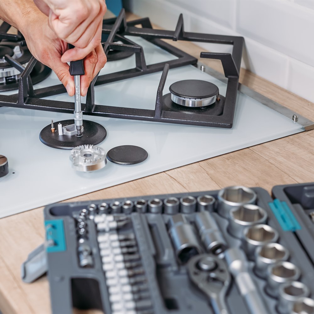 gas-stove-repair-in-modern-kitchen-setting Gas stove repair in modern kitchen setting