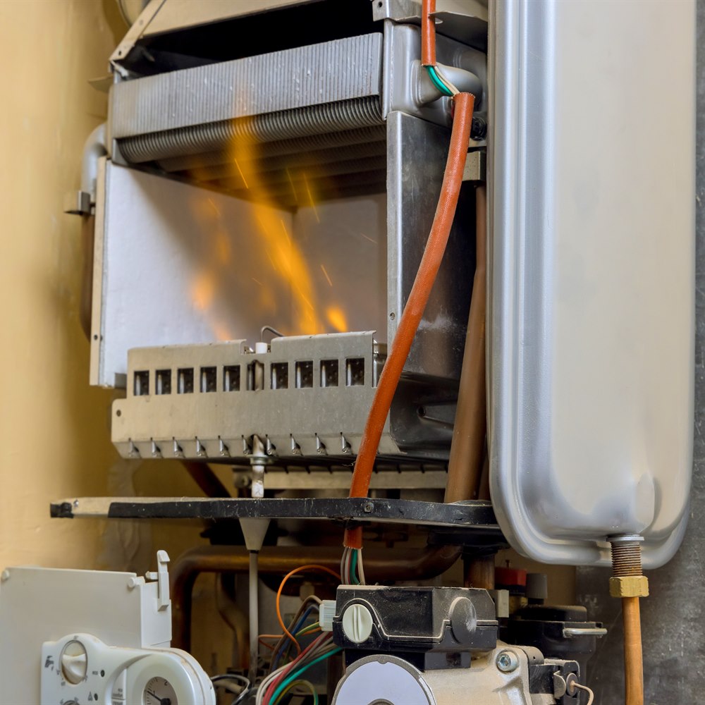 heater-flames-and-components-inside-an-appliance Heater flames and components inside an appliance
