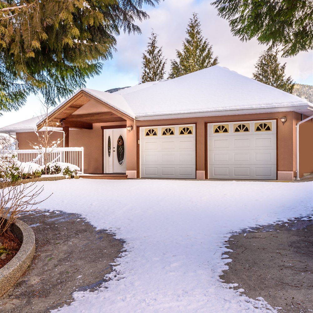 home-exterior-with-fresh-snowfall-during-winter Home exterior with fresh snowfall during winter