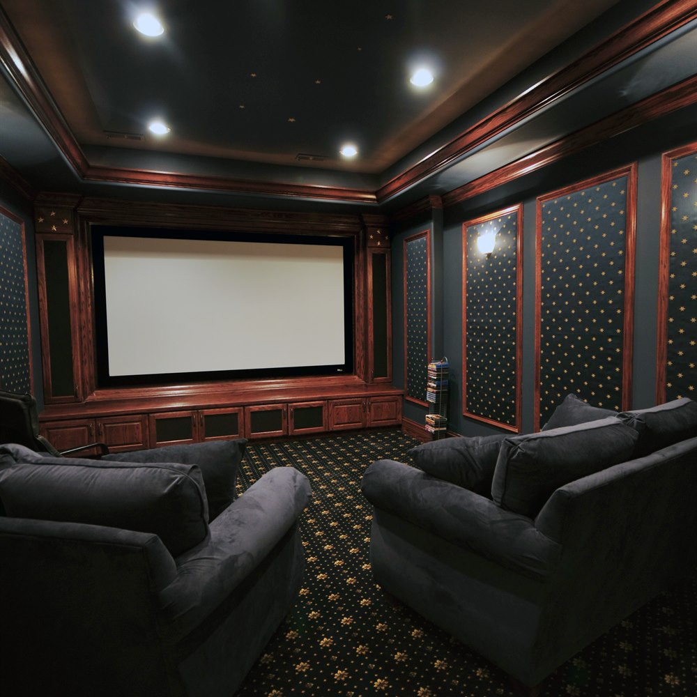 Home theater room with large screen and seating