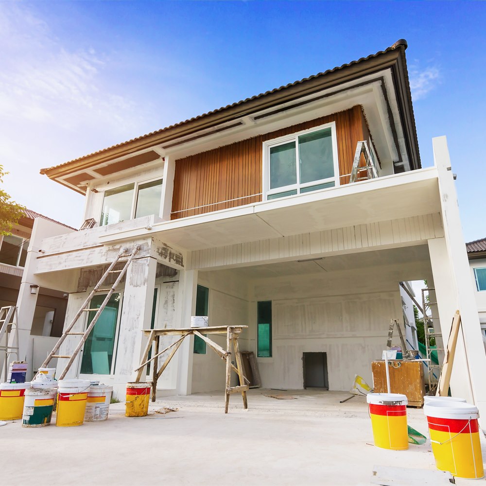 House exterior painting with scaffolding