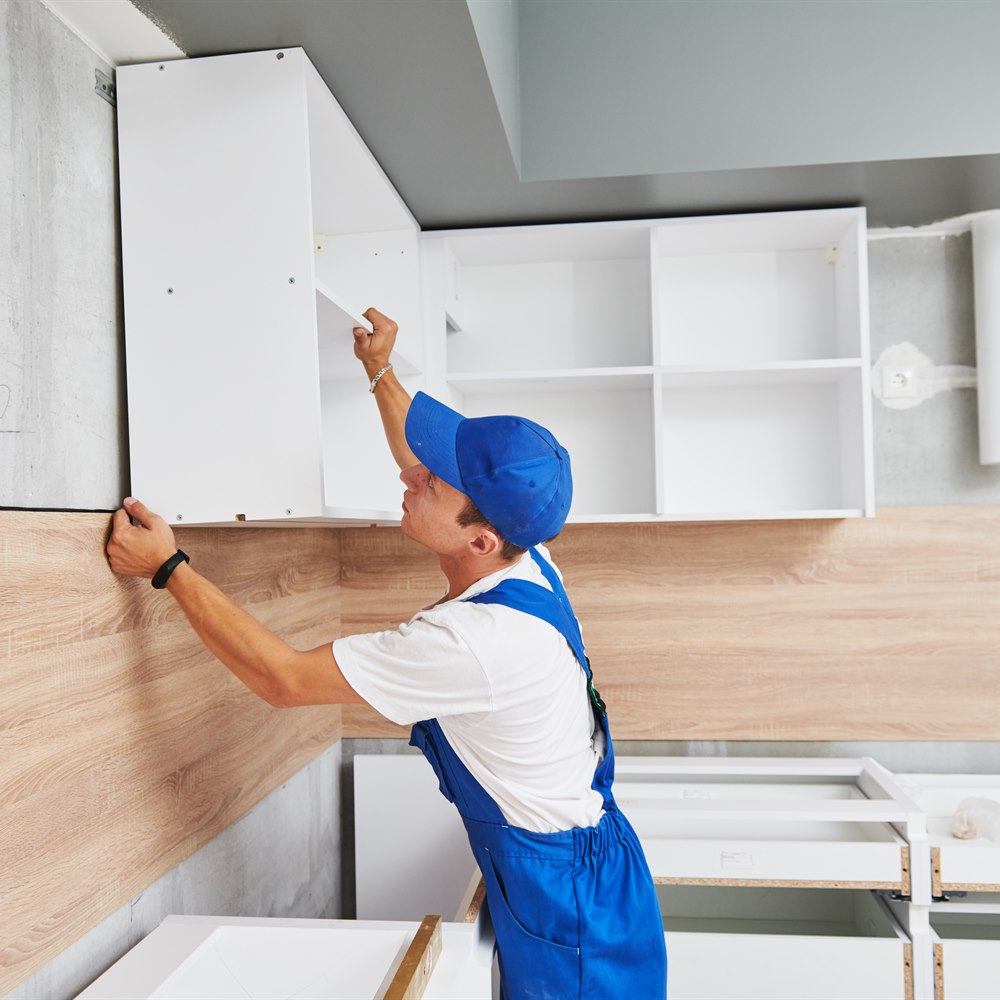 Installing a kitchen wall cabinet