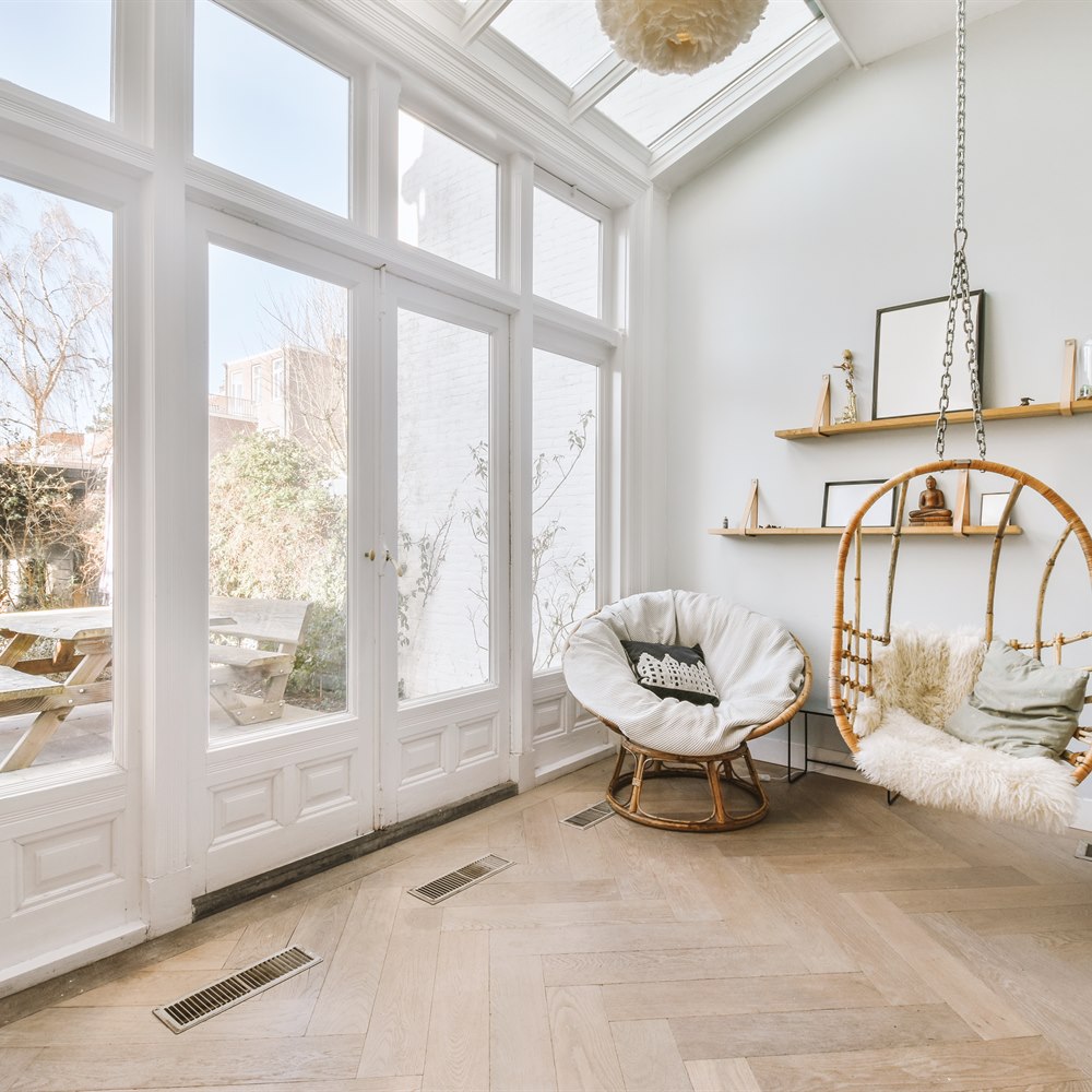 Interior design with wicker furniture and skylight