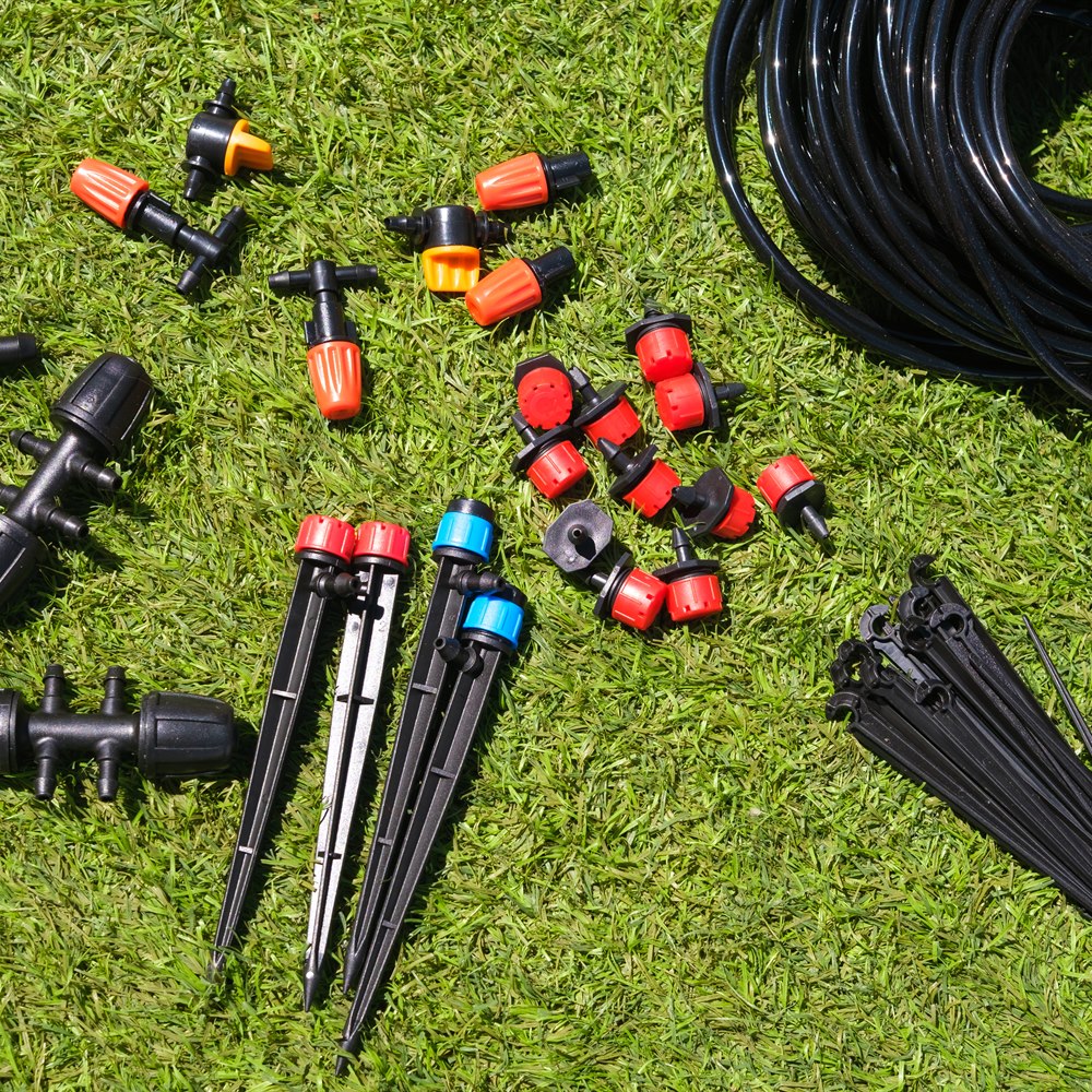 Irrigation equipment on green grass in the sunshin