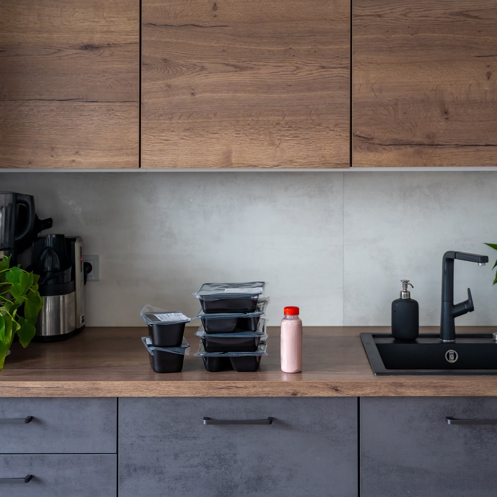 kitchen-counter-with-lunch-boxes-and-plant Kitchen counter with lunch boxes and plant