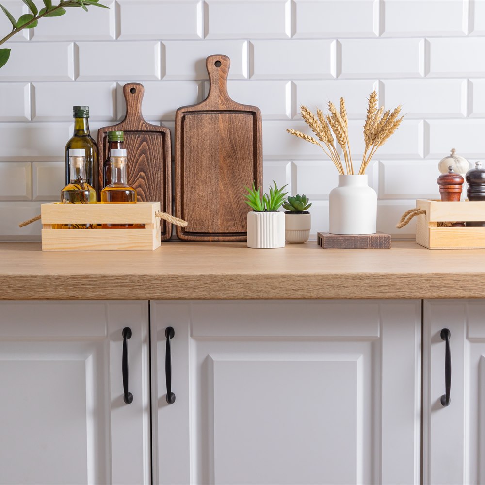Kitchen counter with olive oil wheat and plants