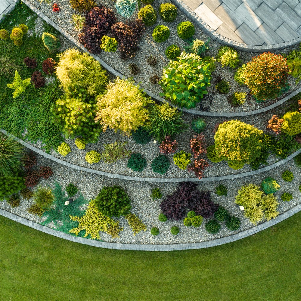 Landscaped garden with stone path aerial view
