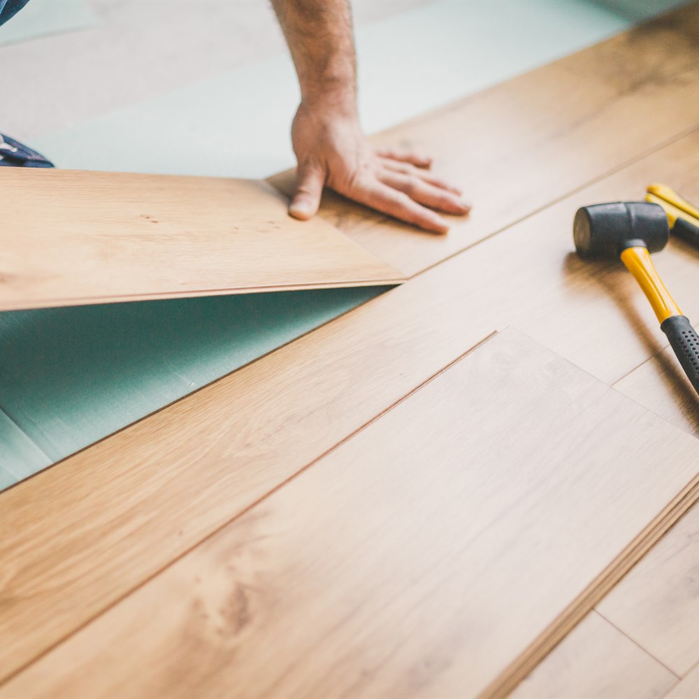 Laying laminate flooring over underlay