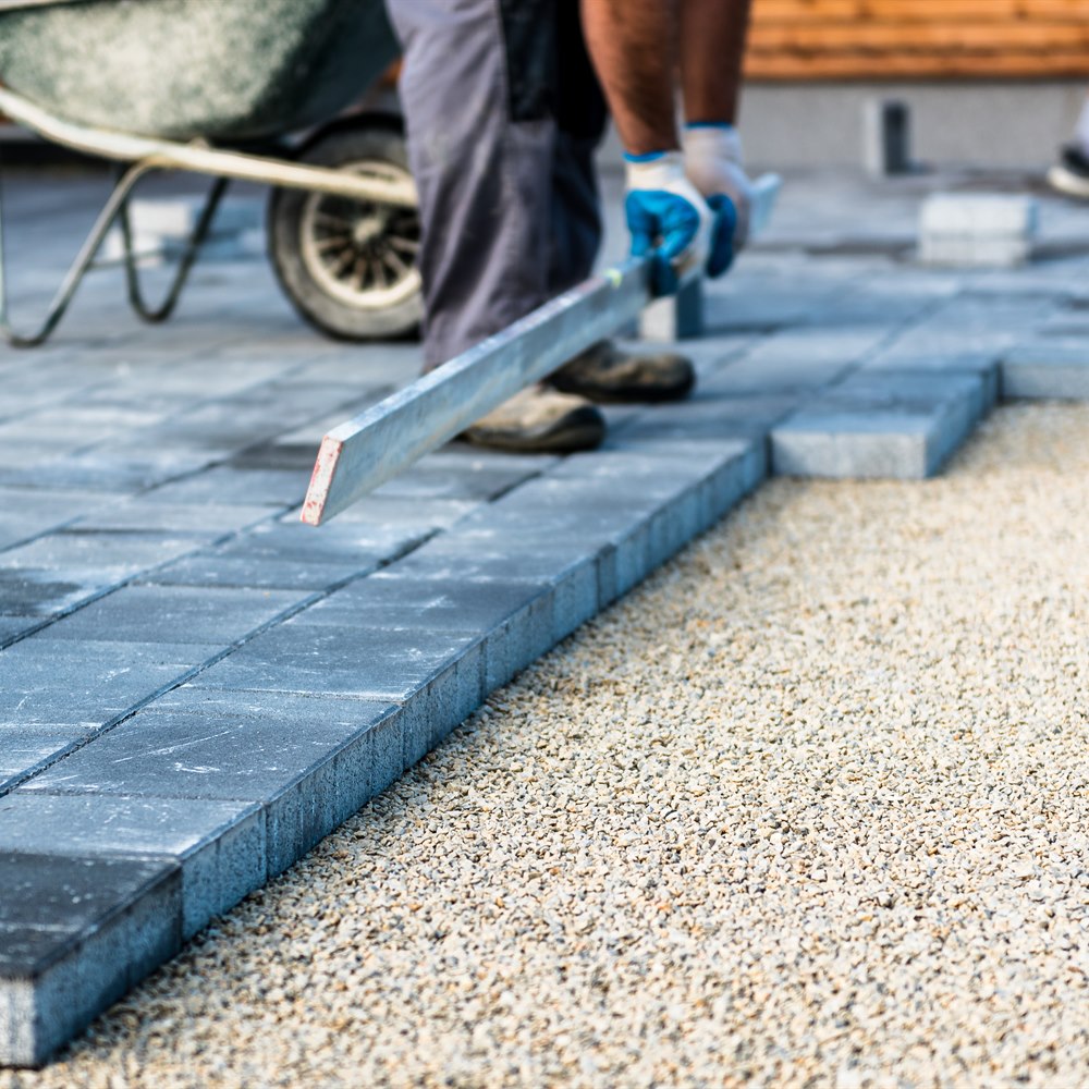 Laying paver stones on a gravel base