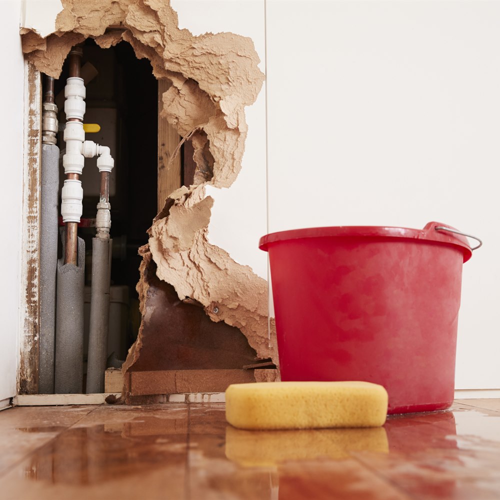 leaky-pipes-in-damaged-wall-requiring-repair Leaky pipes in damaged wall requiring repair