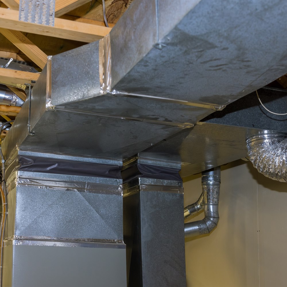 metal-air-conditioning-duct-work-inside-building Metal air conditioning duct work inside building