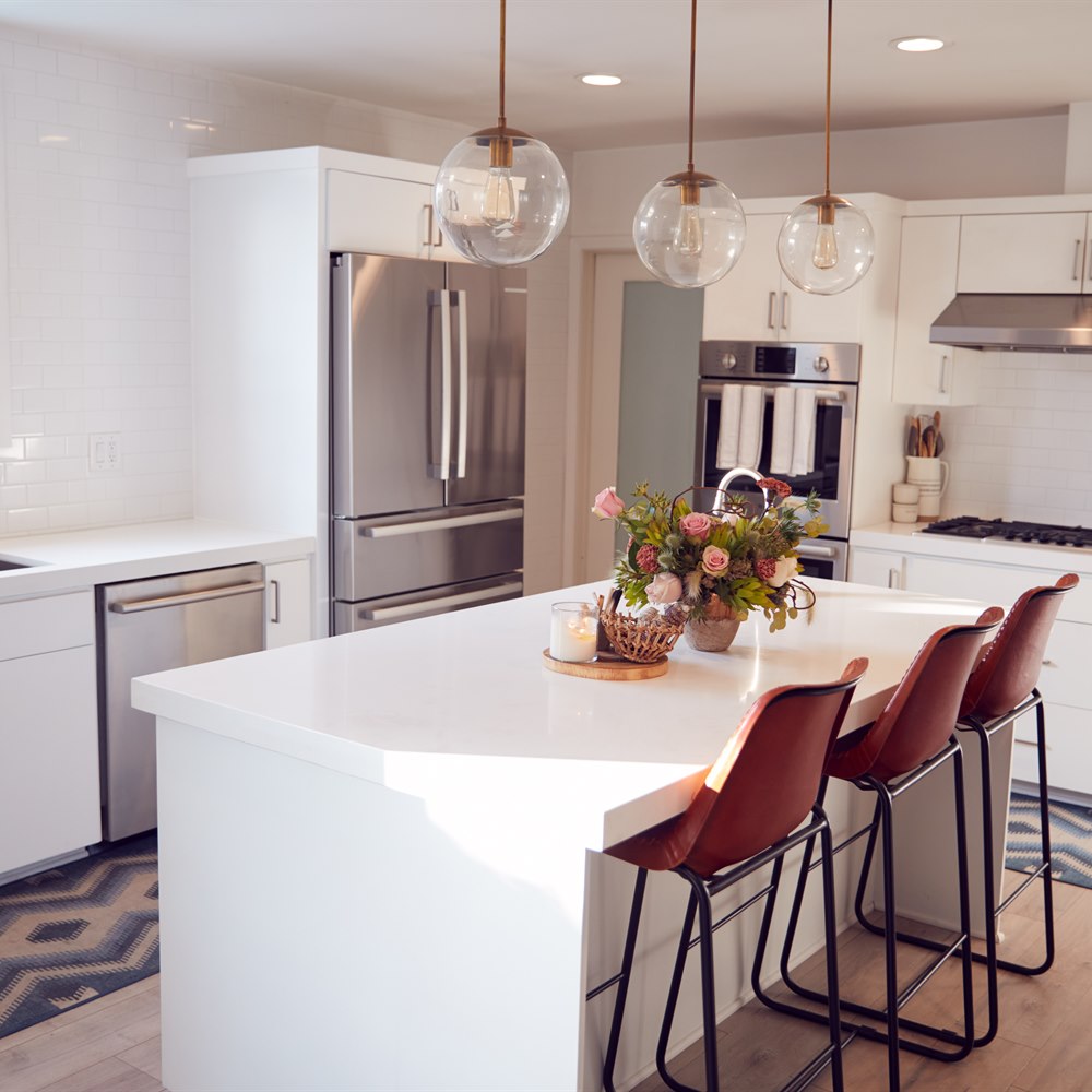 Modern kitchen interior with island and decorations