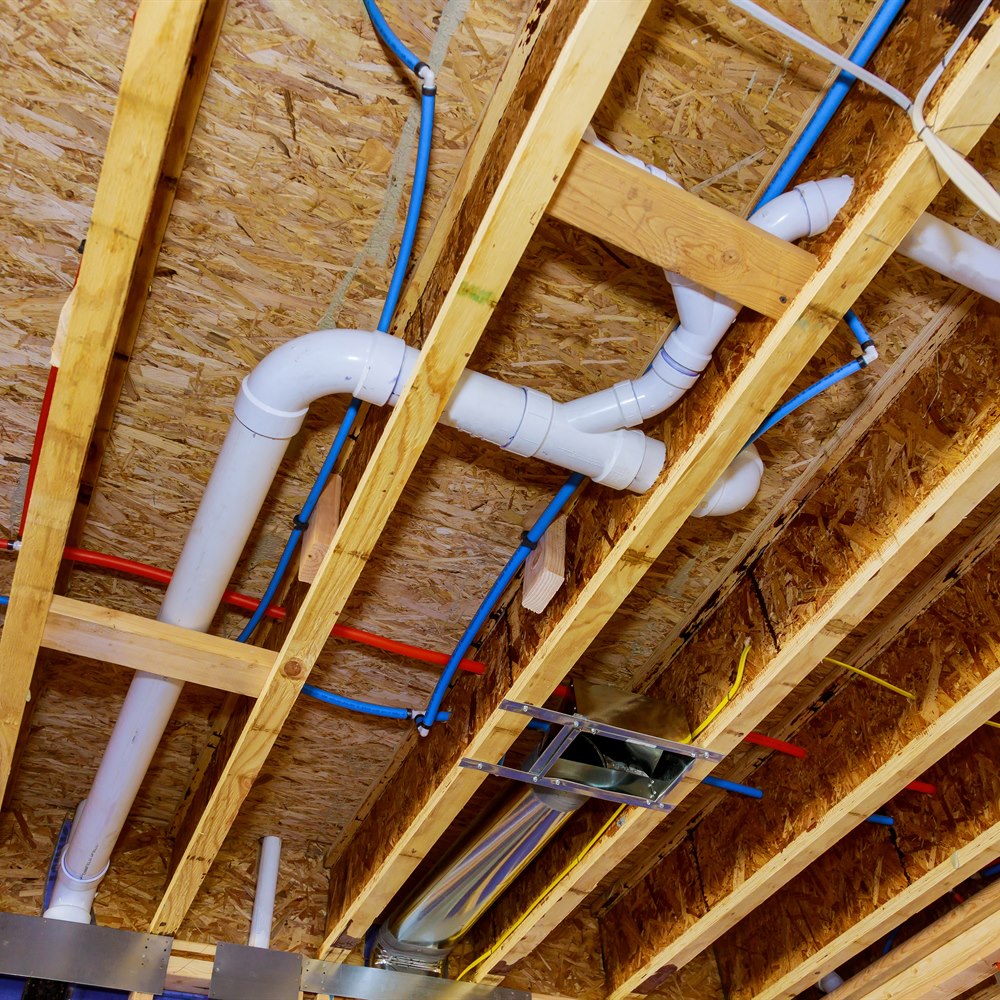 new-home-construction-with-plumbing-and-ventilatio New home construction with plumbing and ventilatio