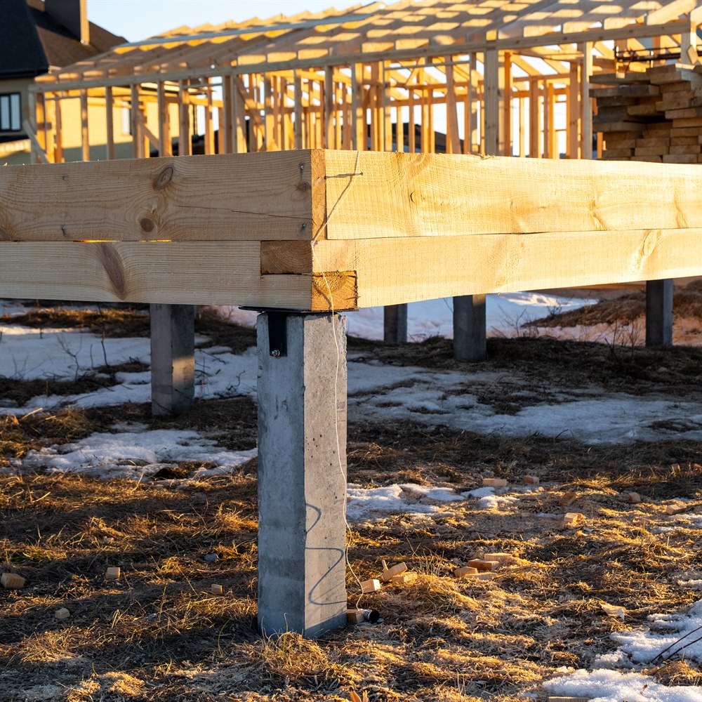 New home construction with wood and concrete foundation