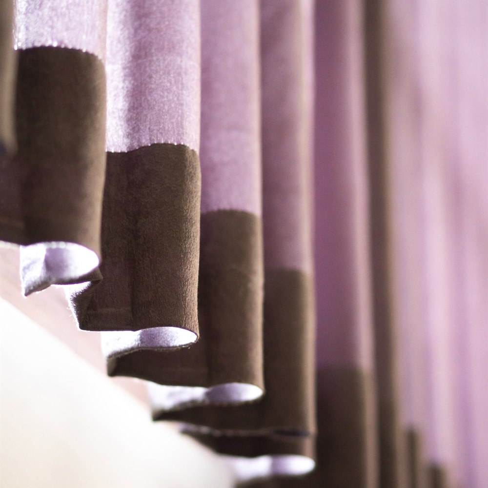 Pink and brown textured fabric close