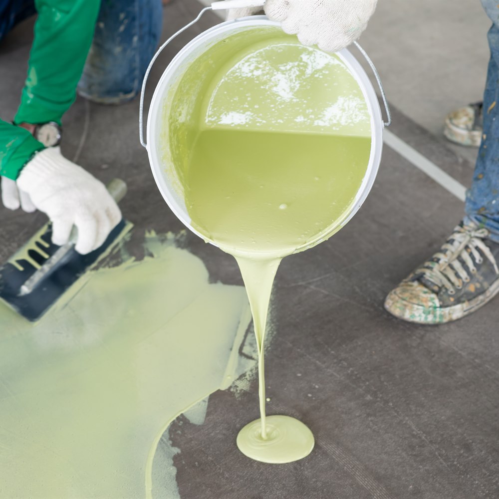Pouring epoxy garage floor coating