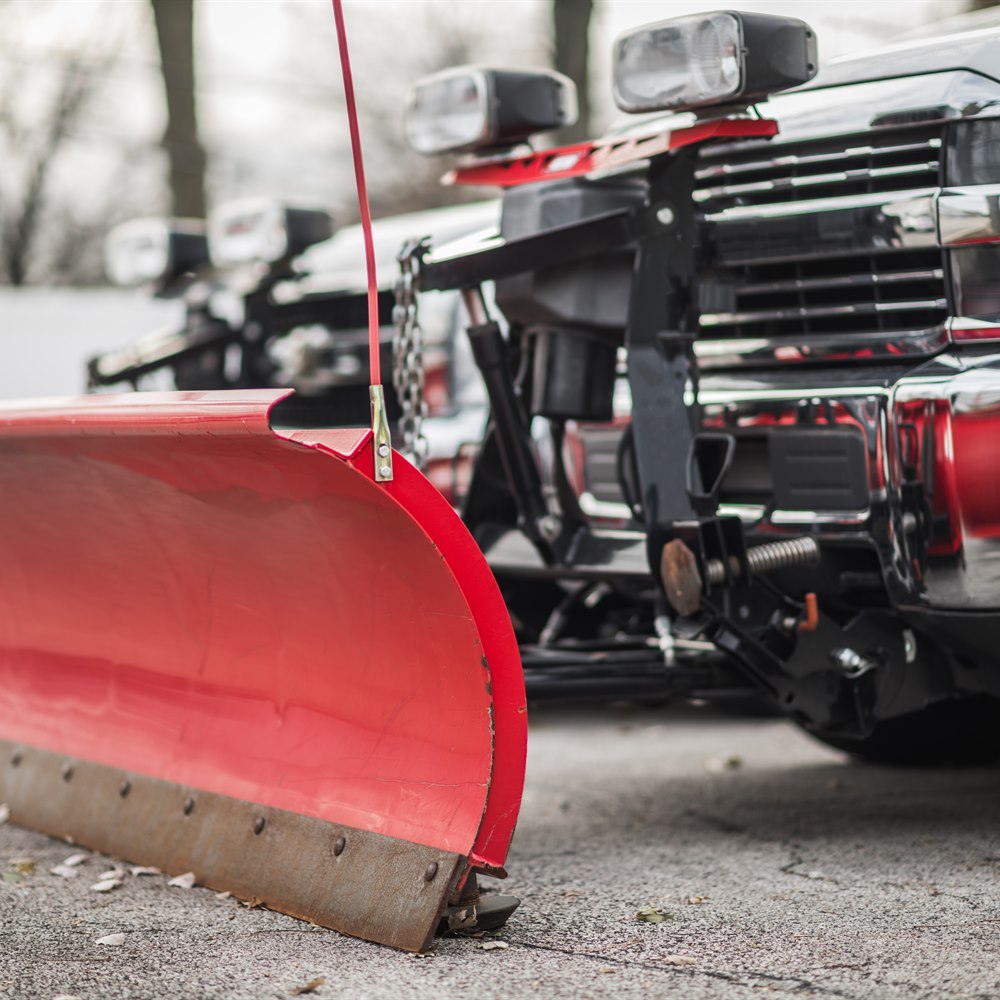 red-snow-plow-blades-attached-to-trucks Red snow plow blades attached