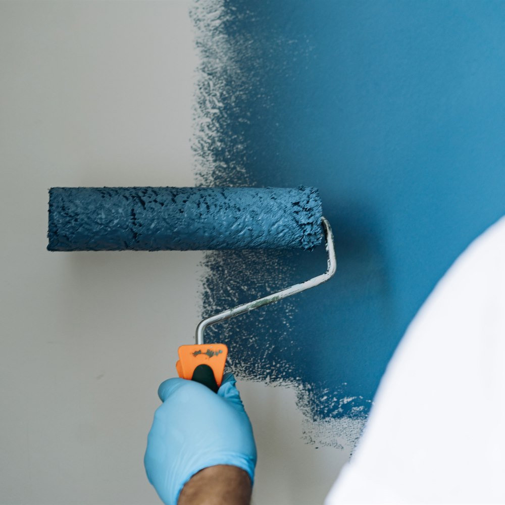 Refreshing wall painted with blue in bright room