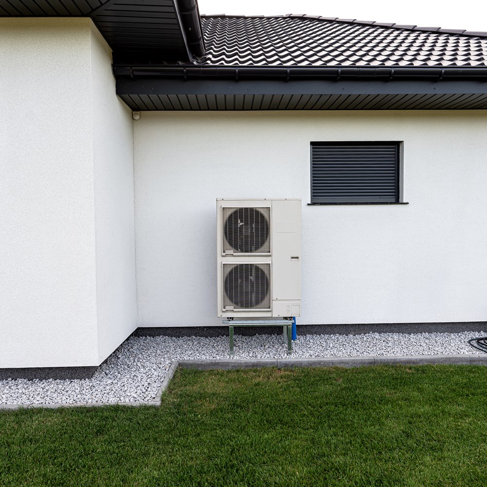 Residential air conditioning unit on modern home