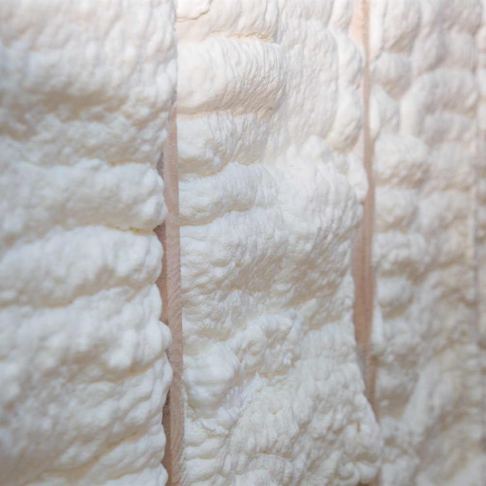 Spray foam insulation in wall cavities