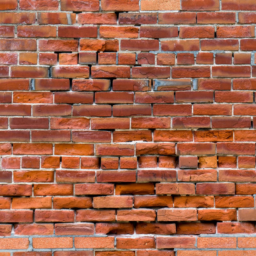 Texture of a red brick wall for background