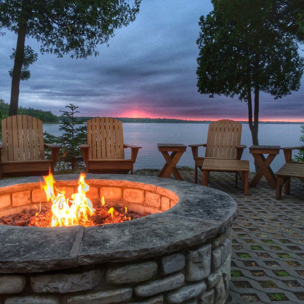 tranquil-lakeside-fire-pit-at-sunset Tranquil lakeside fire pit at sunset