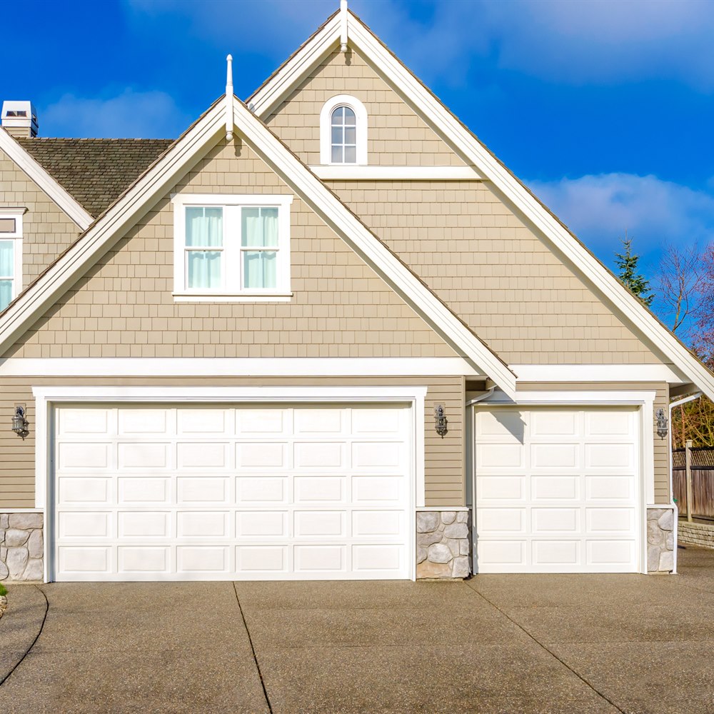 two-car-garage-of-a-luxury-house-against Two car garage of a luxury house against