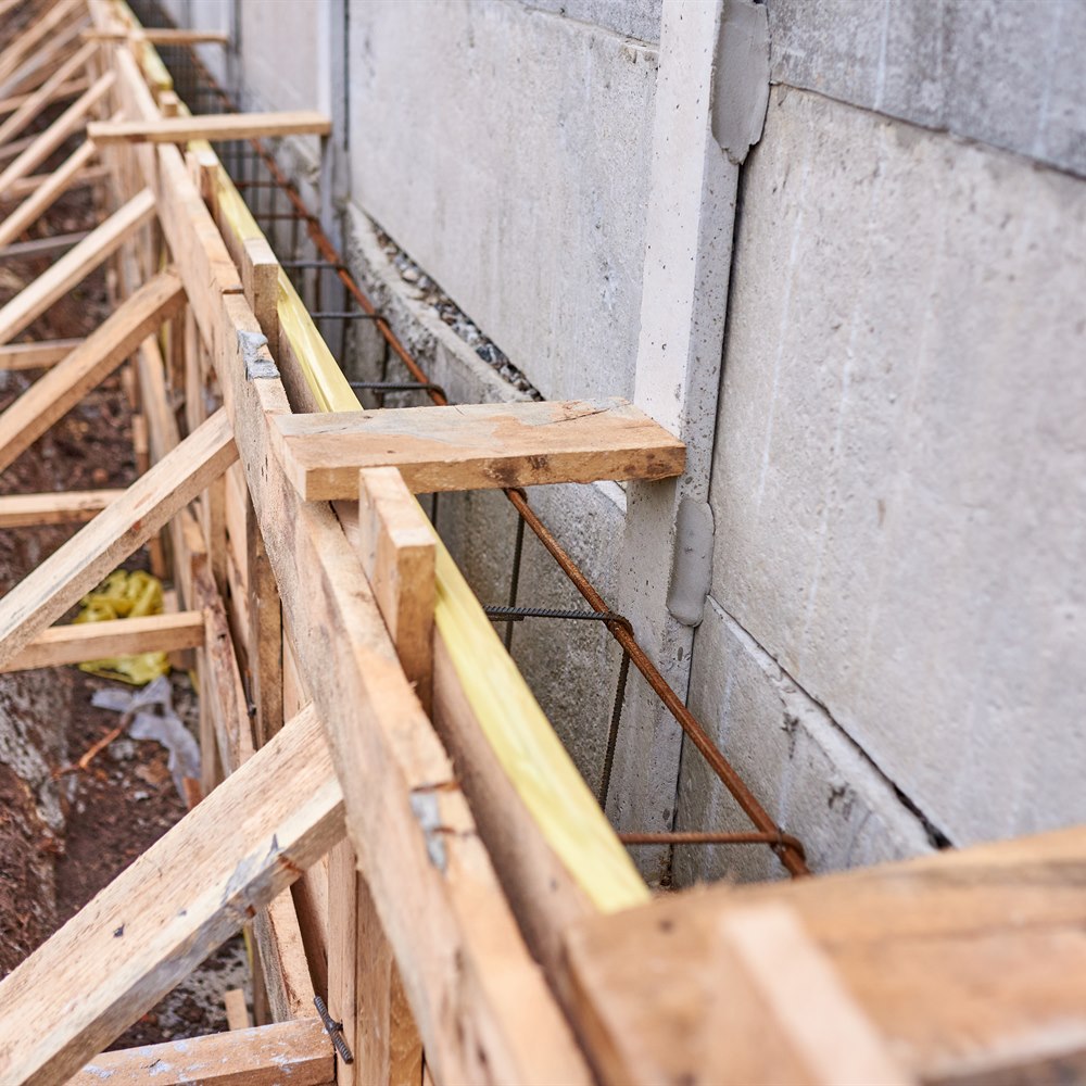 Wooden frame for new concrete foundation construction